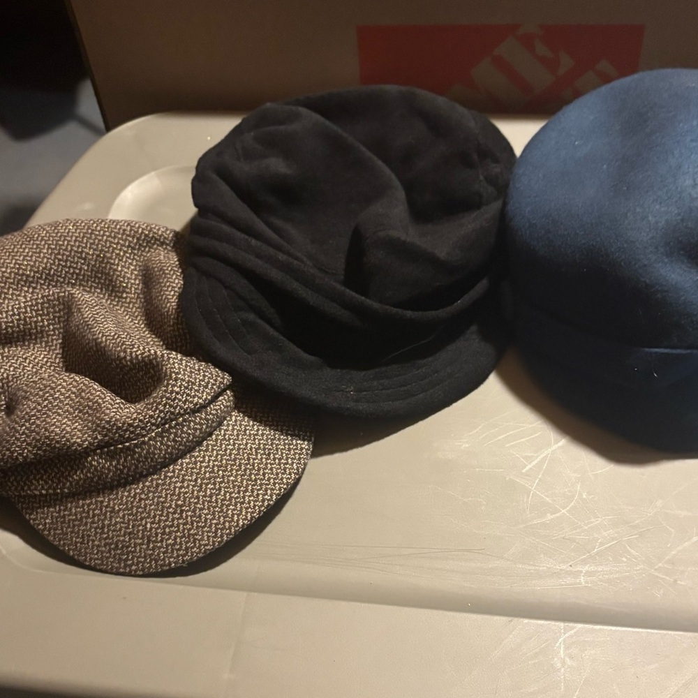 Stylish new with tags Black and Blue Caps Set